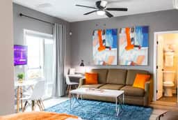 Spacious Studio – Balcony, Desk, A/C & Kitchen - Image 4