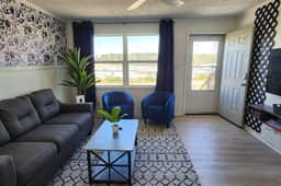 1BR Duplex w/ Smart TVs, Games & Comfort - Image 2