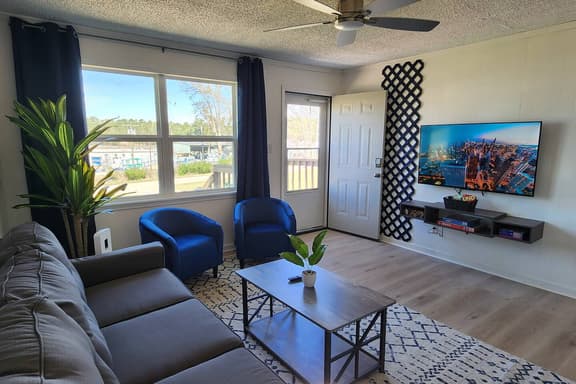 1BR Duplex w/ Smart TVs, Games & Comfort - Image 1